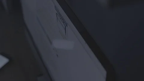 Close Up of Computer Screen Scrolling Through Page Видео 85068602