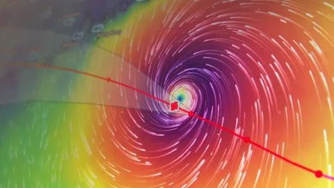Close-up computer screen showing major typhoon with swirling winds and storm Foto stock