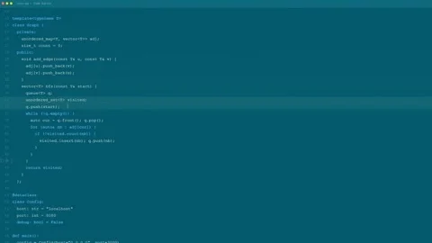 Close up of computer screen showing scrolling lines of software code in a dark Stock Footage 339950848