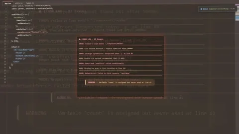 Close up of computer screen showing software code with error messages and Vidéo 340217330