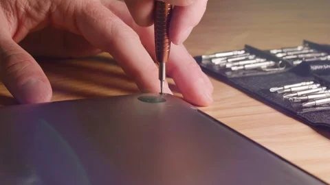 Close up computer technician opening, inspecting, cleaning and fixing Stock Footage 122662491