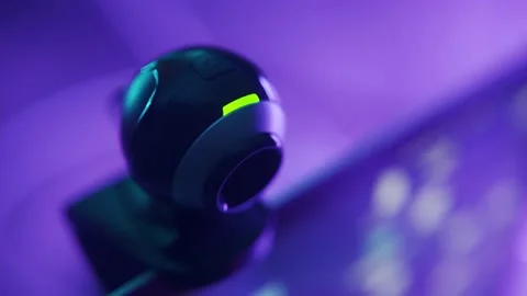Close up on computer webcam as it start recording and filming video Stock Footage 163718537
