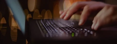A close-up of a computer's keyboard in the modern office with a beautiful vie Stock Footage 143810008