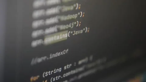 Close-up computer's monitor with code program scrolling Video stock 199018324