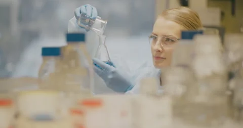 Close-up of Concentrated Lab Worker Performing Test Video stock 318594846