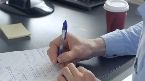 Close-up of concentrated professional writing down a note. Stock-Footage 82232134