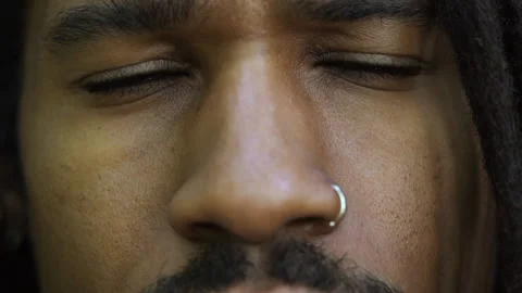 Close Up Concerned or Upset Young Black Man with Nose Ring Stock Footage 142014627