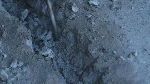 Close-up of concrete breaking with a hammer drill Stock Footage 318272512