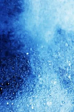 CLose Up of Condensation Bubbles and Marks on A Window Water Background Stock Photos