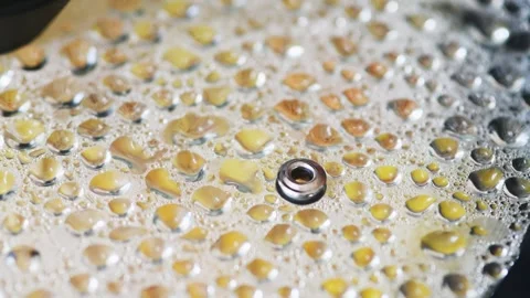 Close up condensation droplets forming pattern on transparent glass pan lid.. Stock Footage 337475080