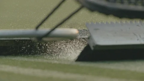 Close-up of condensed grass being refreshed in sports field Stock Footage 105427402