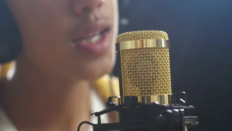 Close Up Of A Condenser Microphone Being Used By A Young Boy Singer Stock Footage 204009951