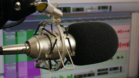 Close Up Condensor Microphone in Shock Mount with Wind Screen and DAW Stock Footage 96909483