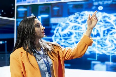 Close up of conference speaker explaining artificial intelligence technology Fotos de archivo