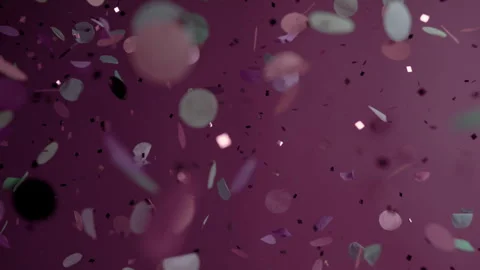Close up of Confetti and Glitter Falling Against a Purple Backdrop Stock Footage 270409711