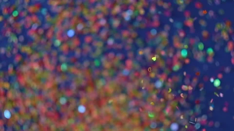 Close up Confetti explosion on black background. Slow Motion confetti falling Stock Footage 151953485
