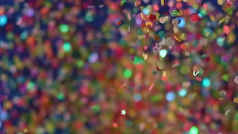 Close up Confetti explosion on black background. Slow Motion confetti falling Stock Footage 151961683