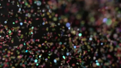 Close up Confetti explosion on black background. Slow Motion confetti falling Stock Footage 152304715