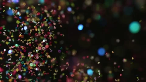 Close up Confetti explosion on black background. Slow Motion confetti falling Stock Footage 152485744