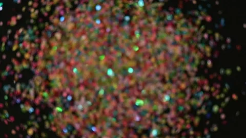 Close up Confetti explosion on black background. Slow Motion confetti falling Stock Footage 152554105