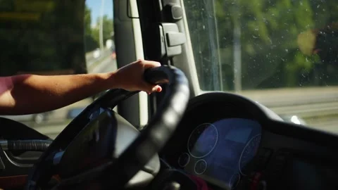Close-up of a confident hold on the steering wheel of a truck. Stock Footage 309301798