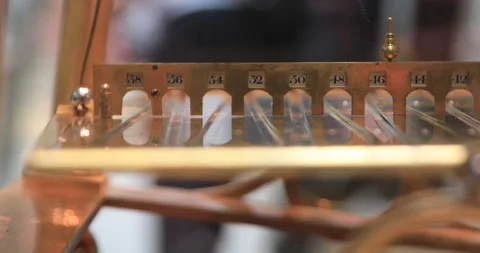 Close-up of Congreve rolling ball clock scale in British Museum Stock Footage 321020191