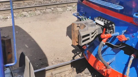 Close up of Connecting passenger wagons, train at the station Stock Footage 63083784