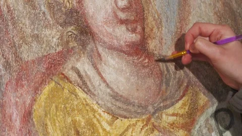 Close-Up of Conservator Retouching Historic Baroque Wall Painting Stock-Footage 345259295
