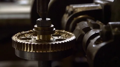 Close up of the construction of a gear with the lathe Stock Footage 126725987