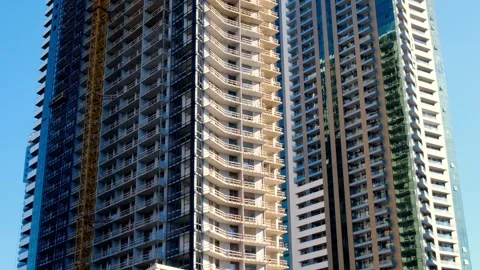 Close-up of the construction of a new residential skyscraper. Stock Footage 248971824