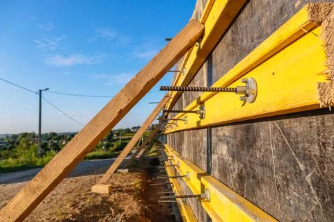 Close-up construction of a retaining wall or counterfort, formwork, reinforce Stock Photos