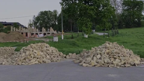 Close-up of construction stones in the foreground Stock Footage 334556994