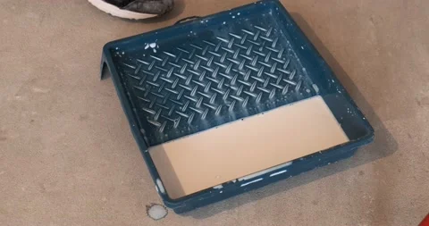 Close-up of construction tray for paint, primer is poured into plastic tray Stock Footage 130428573