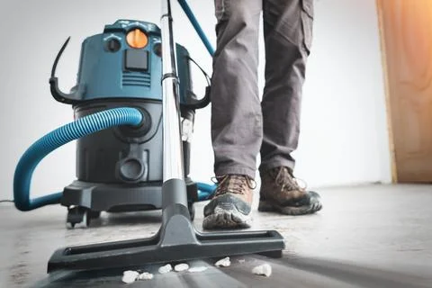Close up on construction vacuum cleaner, construction cleaning service Stock Photos
