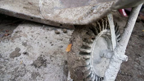 Close up of construction worker pushing a wheelbarrow Stock Footage 158978862