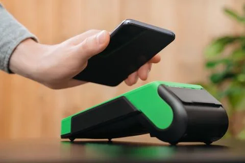 Close-up contactless payment technology in store Stock Photos