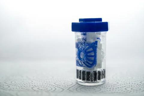 Close-up of a container for cleaning and storing contact lenses for the eyes Stock Photos