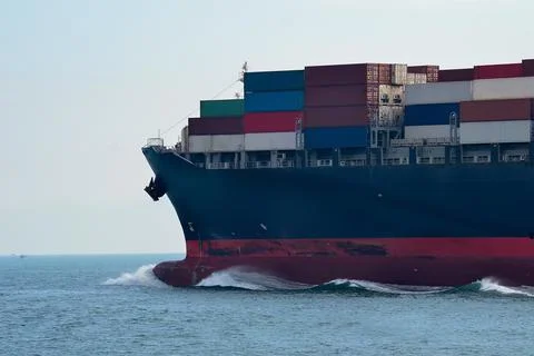 Close Up of Container Ship Bow with Multicolored Containers at Sea Stock Photos