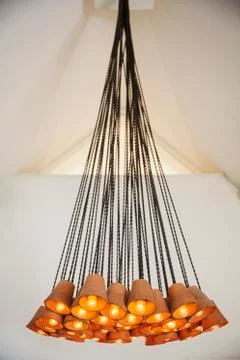 Close up of contemporary chandelier made out of terracotta flowerpots in a Stock Photos
