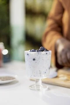 Close up of content creator filming a chia pudding presentation Stock Photos