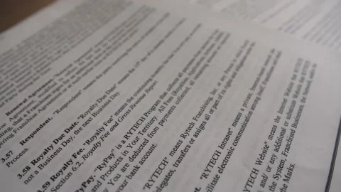 Close up of a contract agreement paper - Tracking, slow motion shot bottom Stock Footage 141141381