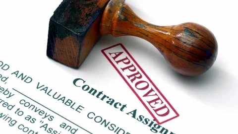 Close up of contract assignment approved Stock Footage 345368341