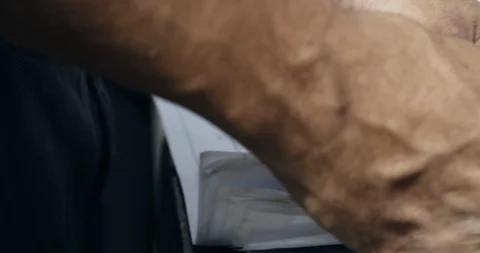 Close up contractor reading blue print plans at constructon site Stock-Footage 103238031