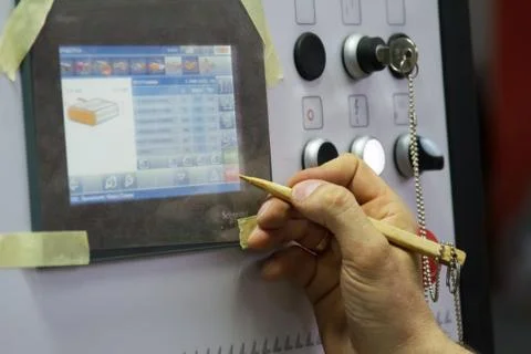 Close-up Control Panel of single sided automatic edge banders in a private fu Stock-Fotos