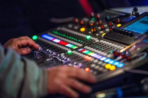 Close-Up of Controlling a Digital Live Mixing Sound Console in 4K Resolution Stock Photos