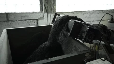 Close up of conveyor belt with crushed stone, shooting in slow motion. Stock Footage 200869391