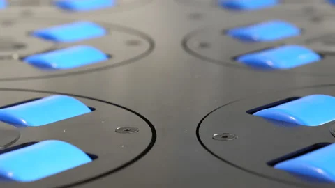 Close up of conveyor transporter rollers spinning 库存影片 204041255