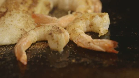 Close up of cook grilling shrimp Stock Footage 104881719
