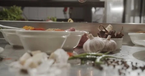 Close-up of cook spoon dipped in bowl with sauce. 4K Slow Motion Stock Footage 124692692