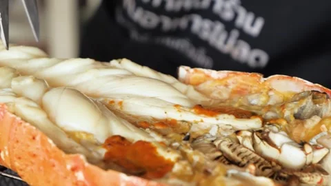 Close-Up of Cooked and Halved Lobster Shell with Tomalley and Meat Video stock 344226884